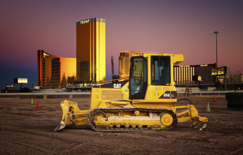 A dozer against the background of the Las Vegas Strip - picture curtsey of Dig This - www.digthisvegas.com